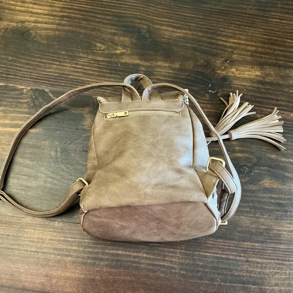 Brown Faux Leather Mini Backpack Tassel Whipstitch Boho Drawstring Bag